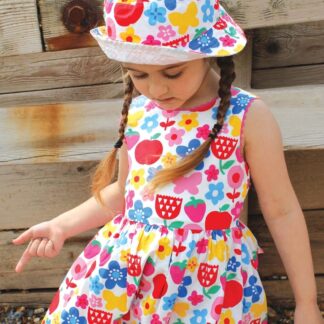 multi coloured organic baby party dress to rent