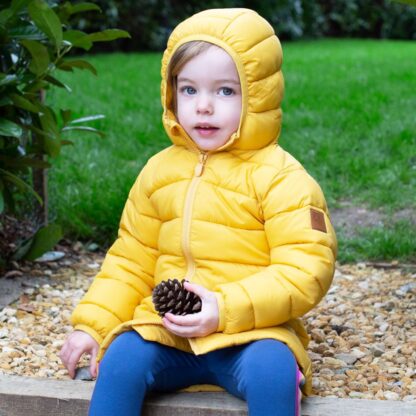 yellow baby coat in recycled nylon