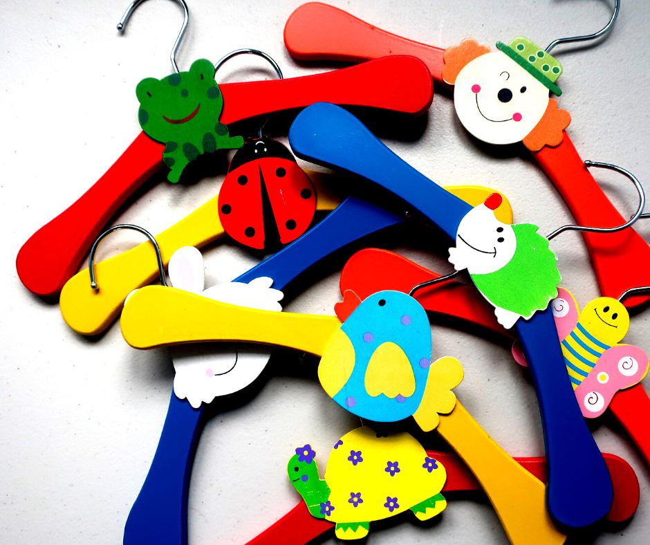 store baby clothes on coloured hangers